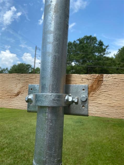 metal bracket to attach a round pole to wood|metal fence post adaptor.